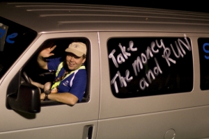Scott Summers, associate professor of accounting, driving a van that took team members to exchange points.